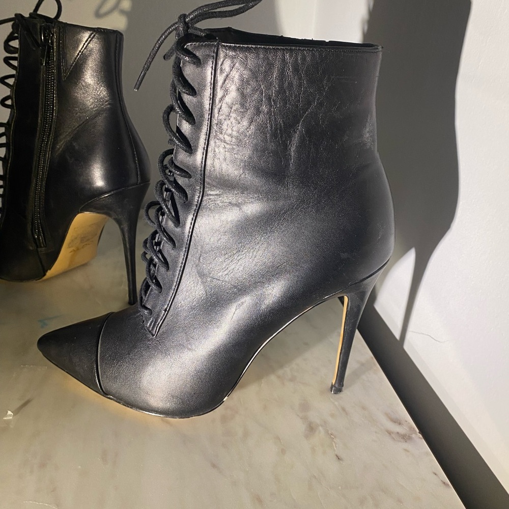 Aldo black tie up stiletto boot. Size 7